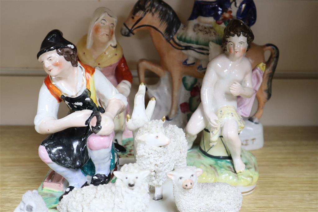 A group of Staffordshire figures and animals